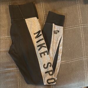 Nike Black and Gray Sweatpants with Bold Logo Design